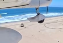 Small Airplane Makes Emergency Landing On the Sand In Huntington Beach